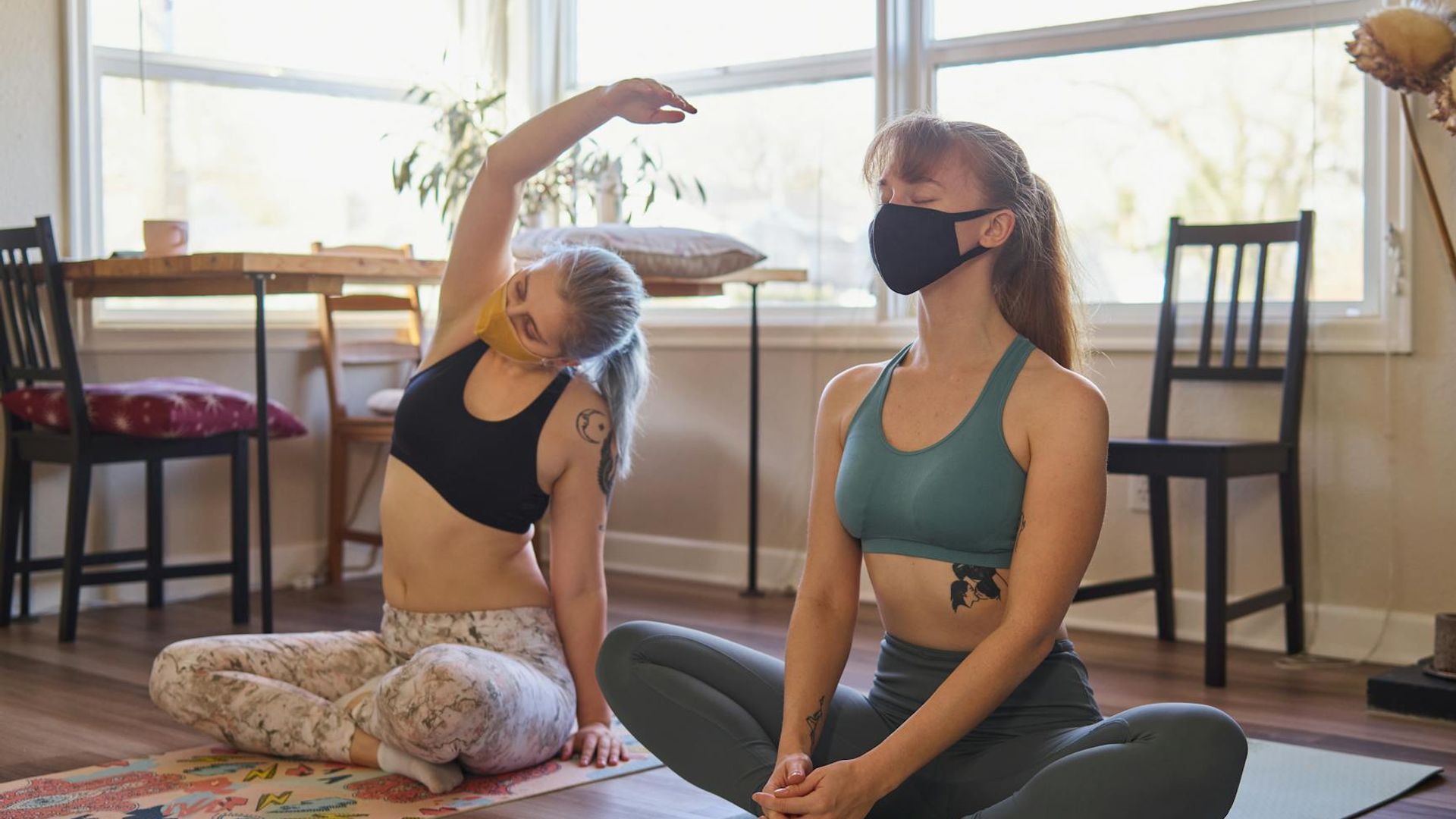 Calm and spacious room with soft light for yoga practice.